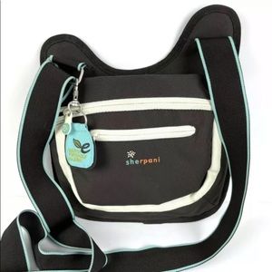 Sherpani switch canvas cross body bag